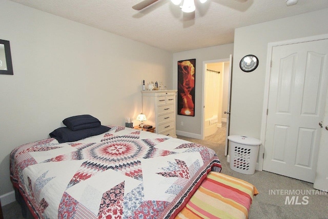415 S Fern St, Nampa, ID 83686 - carpeted bedroom featuring ceiling fan and ensuite bathroom
