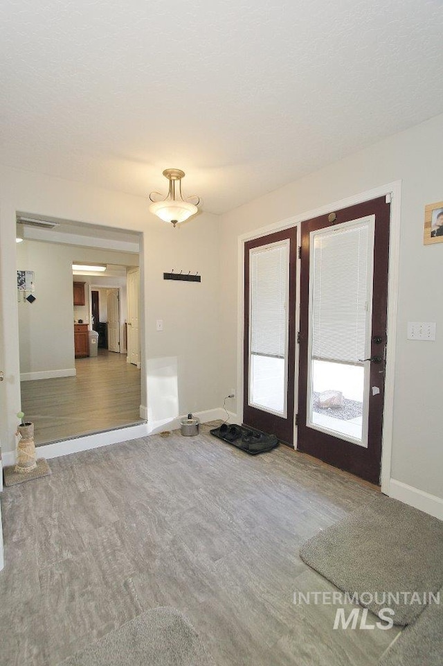 415 S Fern St, Nampa, ID 83686 - interior space featuring wood finished floors and baseboards