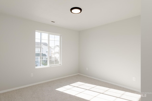 2059 N Thunderbolt St, Mountain Home, ID 83647 - carpeted spare room with baseboards