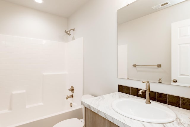 2059 N Thunderbolt St, Mountain Home, ID 83647 - bathroom with vanity, toilet, and washtub / shower combination