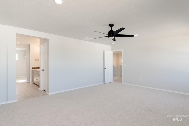 2059 N Thunderbolt St, Mountain Home, ID 83647 - unfurnished bedroom featuring light carpet, baseboards, recessed lighting, connected bathroom, and ceiling fan