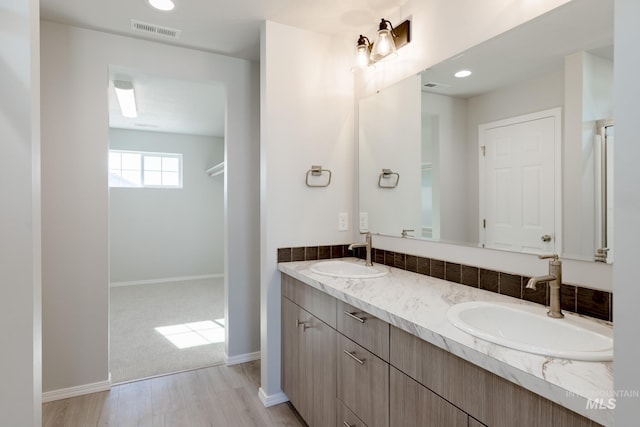 2059 N Thunderbolt St, Mountain Home, ID 83647 - bathroom with double vanity and baseboards
