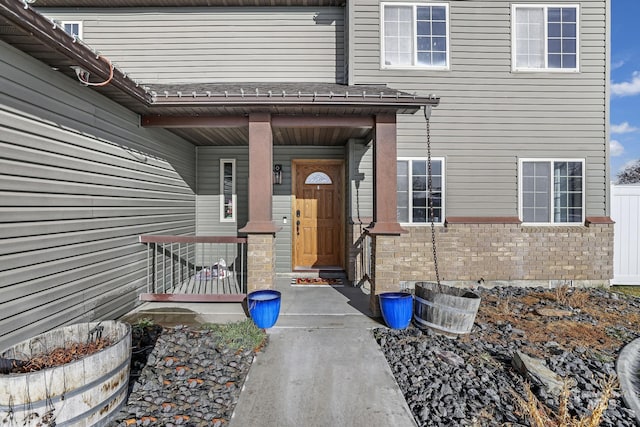 entrance to property with a porch