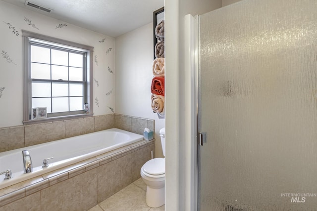 bathroom with separate shower and tub, tile patterned floors, and toilet