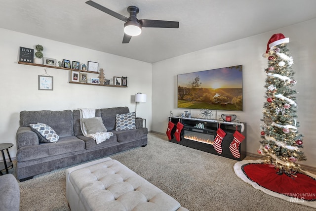 living room with carpet flooring and ceiling fan