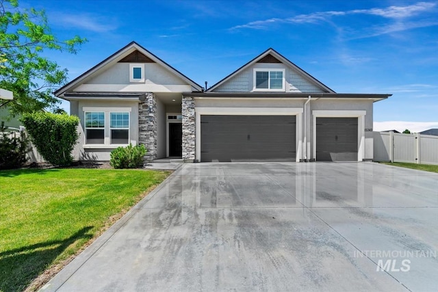 15343 Moss Creek Way, Caldwell, ID 83607 - view of front of property featuring an attached garage, concrete driveway, and stucco siding