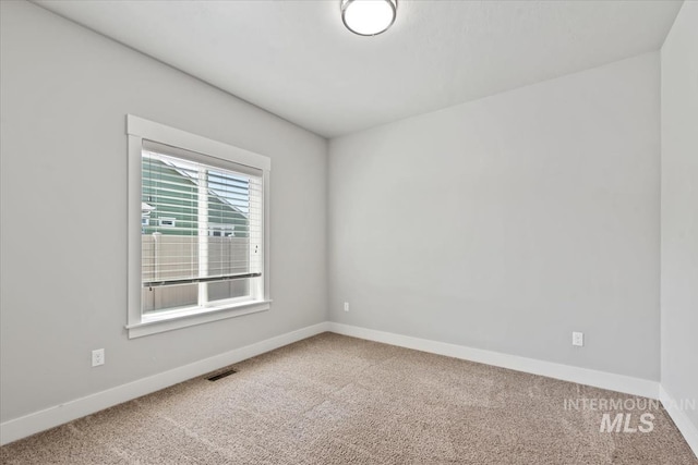 15343 Moss Creek Way, Caldwell, ID 83607 - carpeted spare room featuring baseboards