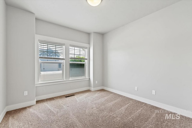 15343 Moss Creek Way, Caldwell, ID 83607 - carpeted spare room featuring baseboards