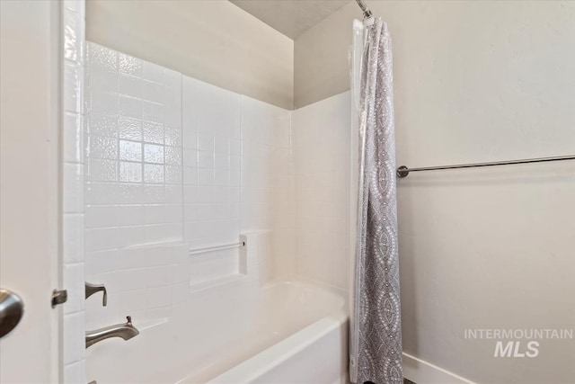15343 Moss Creek Way, Caldwell, ID 83607 - bathroom with shower / bath combo with shower curtain