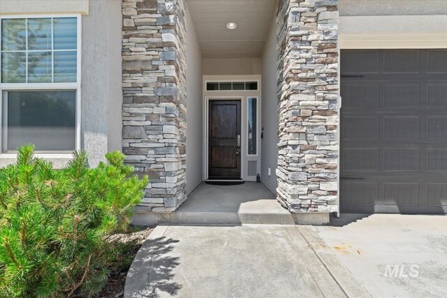 15343 Moss Creek Way, Caldwell, ID 83607 - entrance to property featuring stone siding and stucco siding