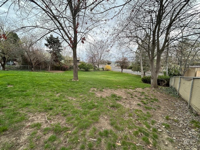 view of yard with fence