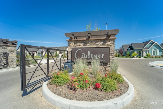 community sign with a residential view