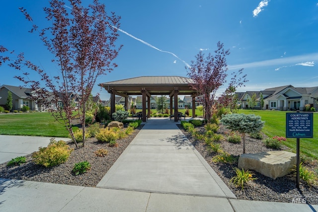 view of home's community with a gazebo, a residential view, and a lawn