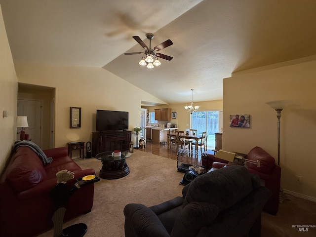 1053 Caswell Ave W, Twin Falls, ID 83301 - carpeted living area featuring a ceiling fan, lofted ceiling, and a chandelier