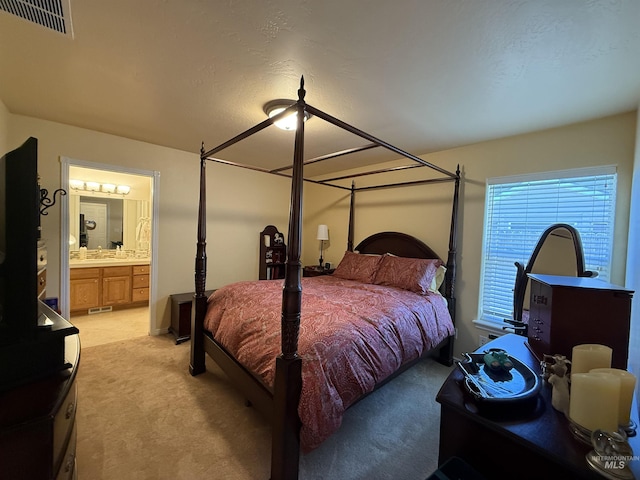 1053 Caswell Ave W, Twin Falls, ID 83301 - bedroom with light carpet and ensuite bath