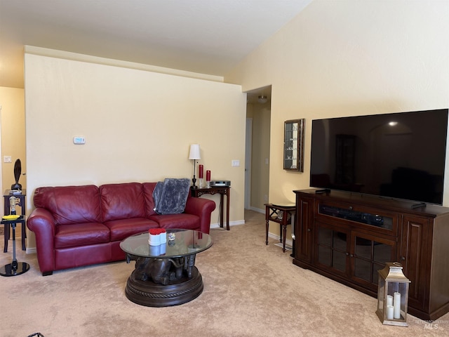 1053 Caswell Ave W, Twin Falls, ID 83301 - carpeted living area with vaulted ceiling and baseboards