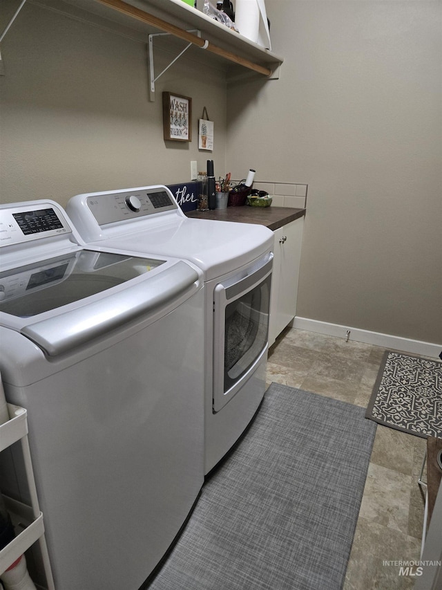 235 Meadow View Dr, Payette, ID 83661 - washroom with washing machine and clothes dryer and cabinet space