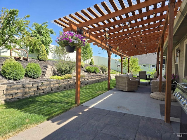 235 Meadow View Dr, Payette, ID 83661 - fenced backyard with an outdoor living space, a pergola, and a patio area