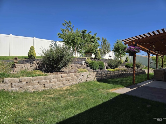 235 Meadow View Dr, Payette, ID 83661 - fenced backyard with a pergola and a patio area