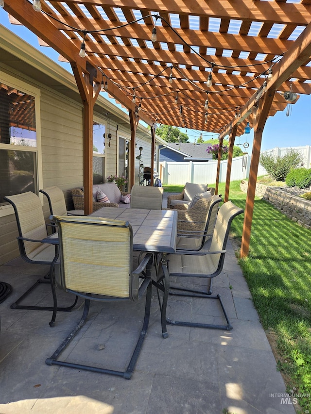 235 Meadow View Dr, Payette, ID 83661 - view of patio with outdoor dining space and a pergola