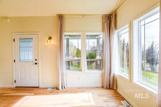 1962 E 6th St, Moscow, ID 83843 - entryway with light wood finished floors, visible vents, and baseboards