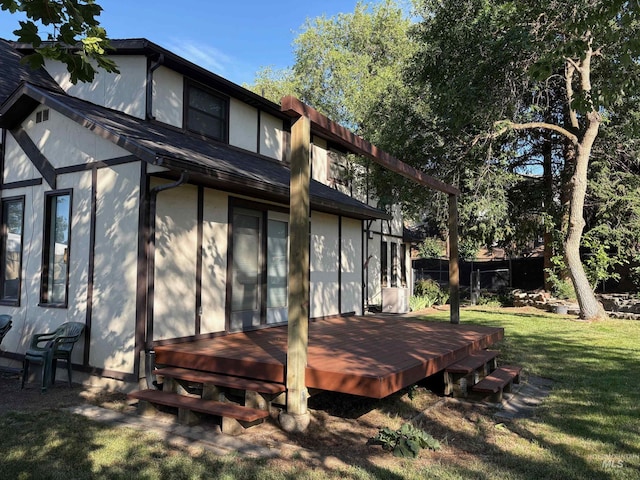 354 W Syringa Ct, Lewiston, ID 83501 - back of property with a lawn, a deck, and a shingled roof