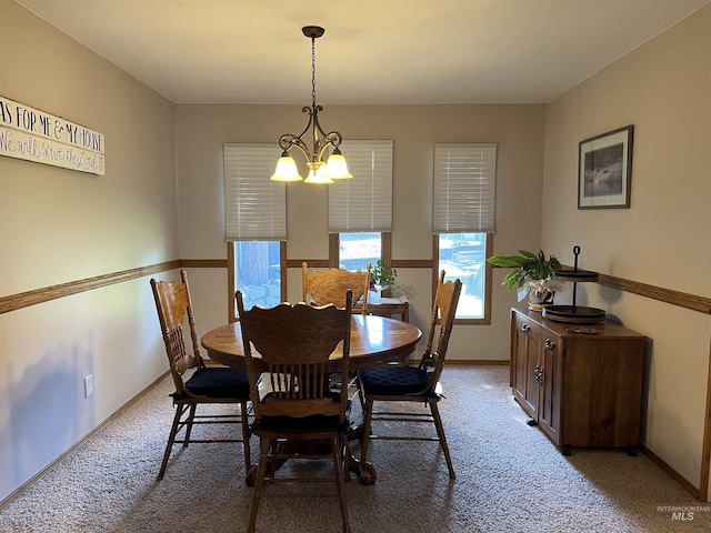 354 W Syringa Ct, Lewiston, ID 83501 - dining space featuring light colored carpet, a chandelier, and baseboards