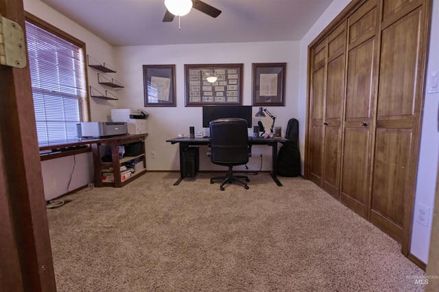 home office with baseboards, carpet, and ceiling fan