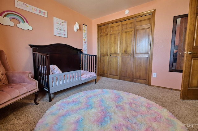 bedroom with a closet and carpet floors