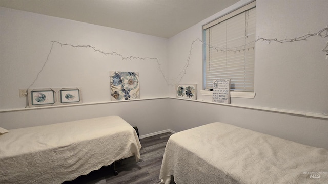 24 Shady Ln, Garden Valley, ID 83622 - bedroom with dark wood-style flooring and baseboards