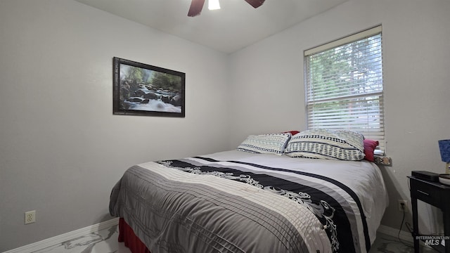 24 Shady Ln, Garden Valley, ID 83622 - bedroom with marble finish flooring, baseboards, and a ceiling fan