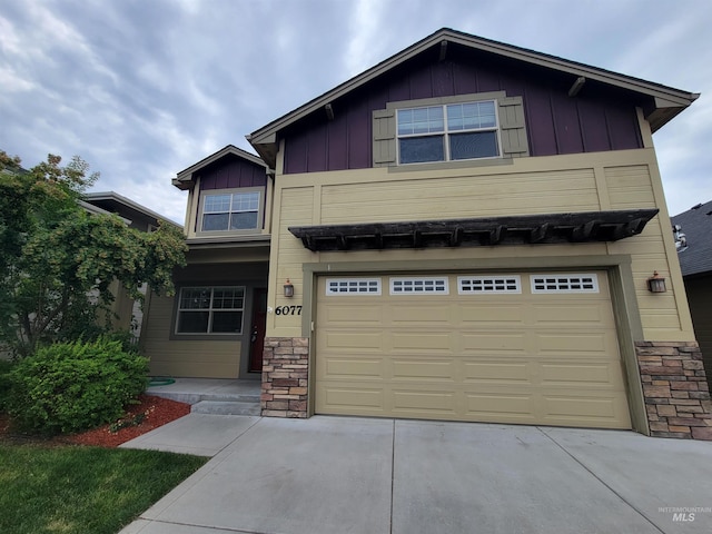 craftsman house with a garage