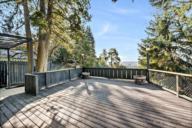 wooden terrace featuring a pergola