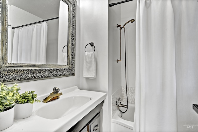 bathroom with vanity and shower / bath combo with shower curtain