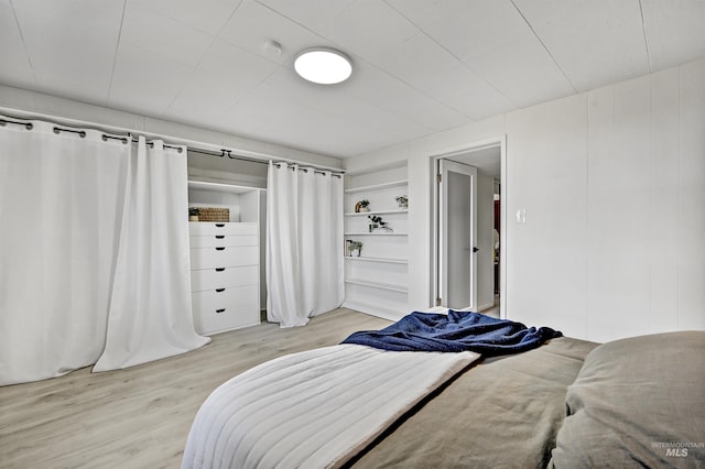 bedroom with light hardwood / wood-style flooring