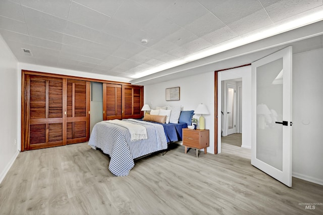 bedroom featuring light hardwood / wood-style floors