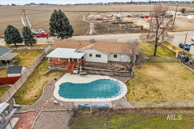 view of swimming pool with a fenced in pool, a fenced backyard, a patio, and stairs