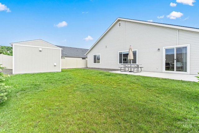 10255 W Gladiola St, Star, ID 83669 - rear view of property with a patio area and an outbuilding