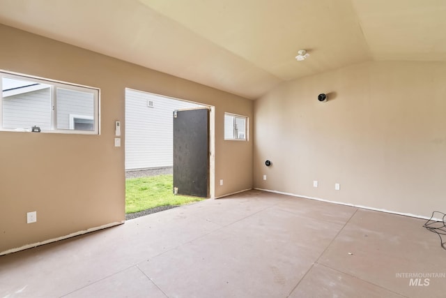 10255 W Gladiola St, Star, ID 83669 - empty room with lofted ceiling and concrete floors