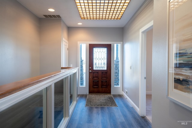 foyer entrance featuring recessed lighting, wood finished floors, visible vents, and baseboards