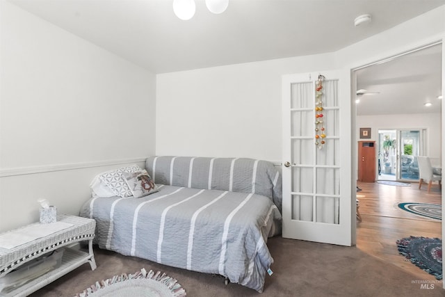 bedroom with wood finished floors