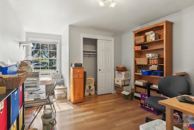 office space with light wood-style floors