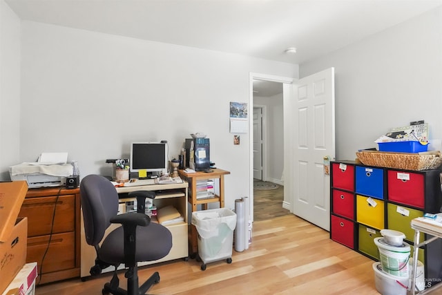office space with wood finished floors
