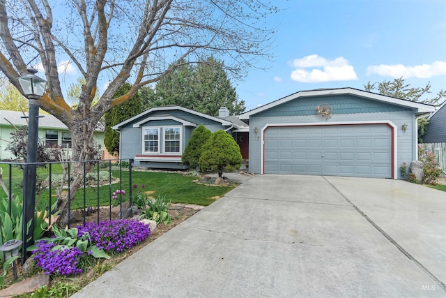ranch-style home featuring a garage, fence, a front yard, a chimney, and concrete driveway