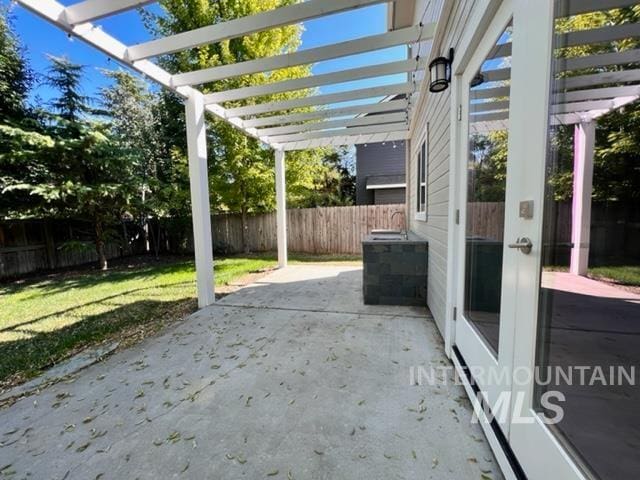 view of patio featuring a pergola