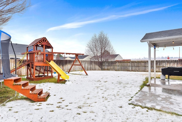 view of snow covered playground