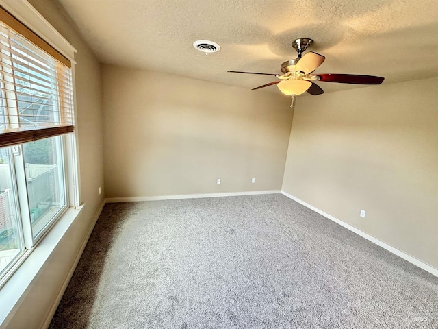 1241 W Ann Taylor St, Meridian, ID 83646 - carpeted empty room featuring ceiling fan, a textured ceiling, and baseboards