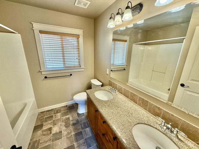 1241 W Ann Taylor St, Meridian, ID 83646 - bathroom with baseboards, toilet, washtub / shower combination, and double vanity