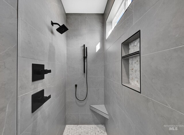 11321 S Yeoman St, Kuna, ID 83634 - full bathroom featuring a tile shower
