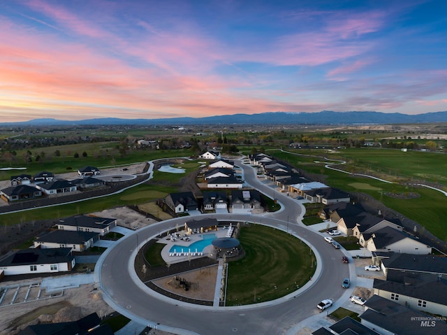 11321 S Yeoman St, Kuna, ID 83634 - aerial view at dusk of a mountain view, golf course view, and a residential view